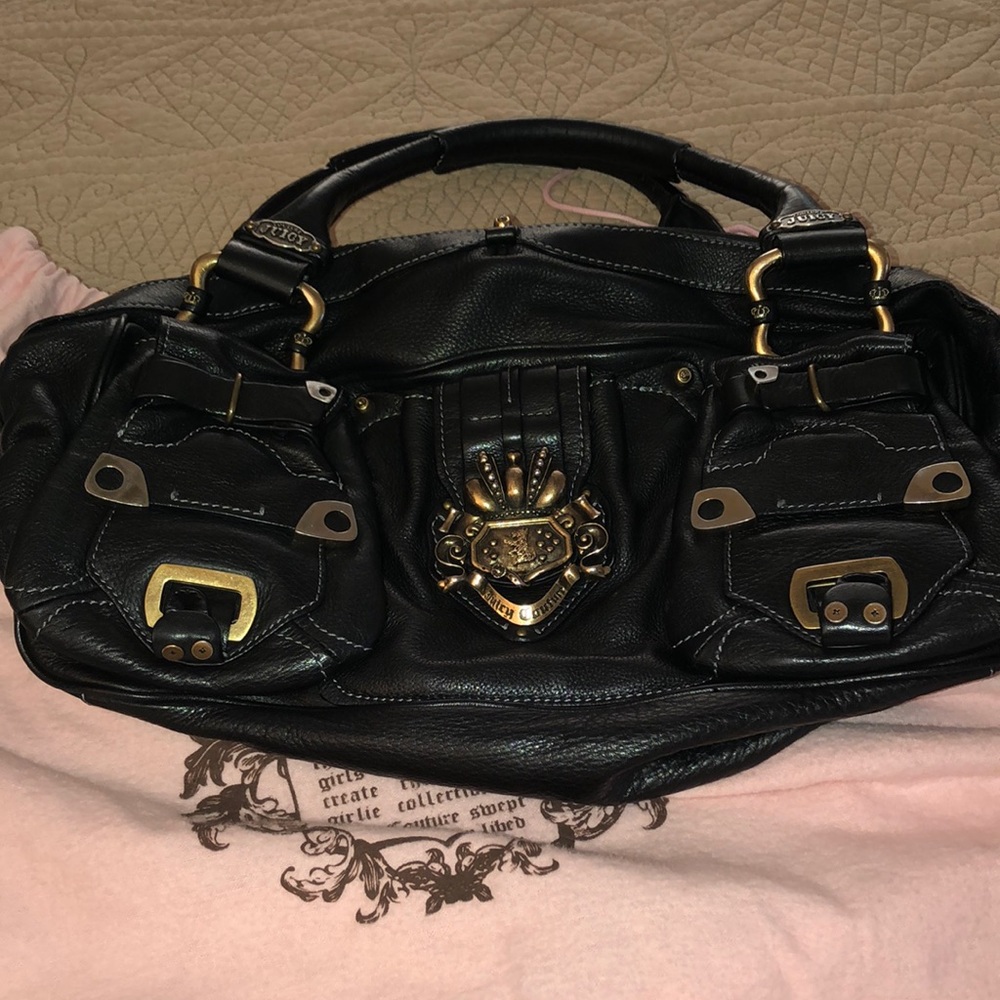Black leather juicy couture handbag.